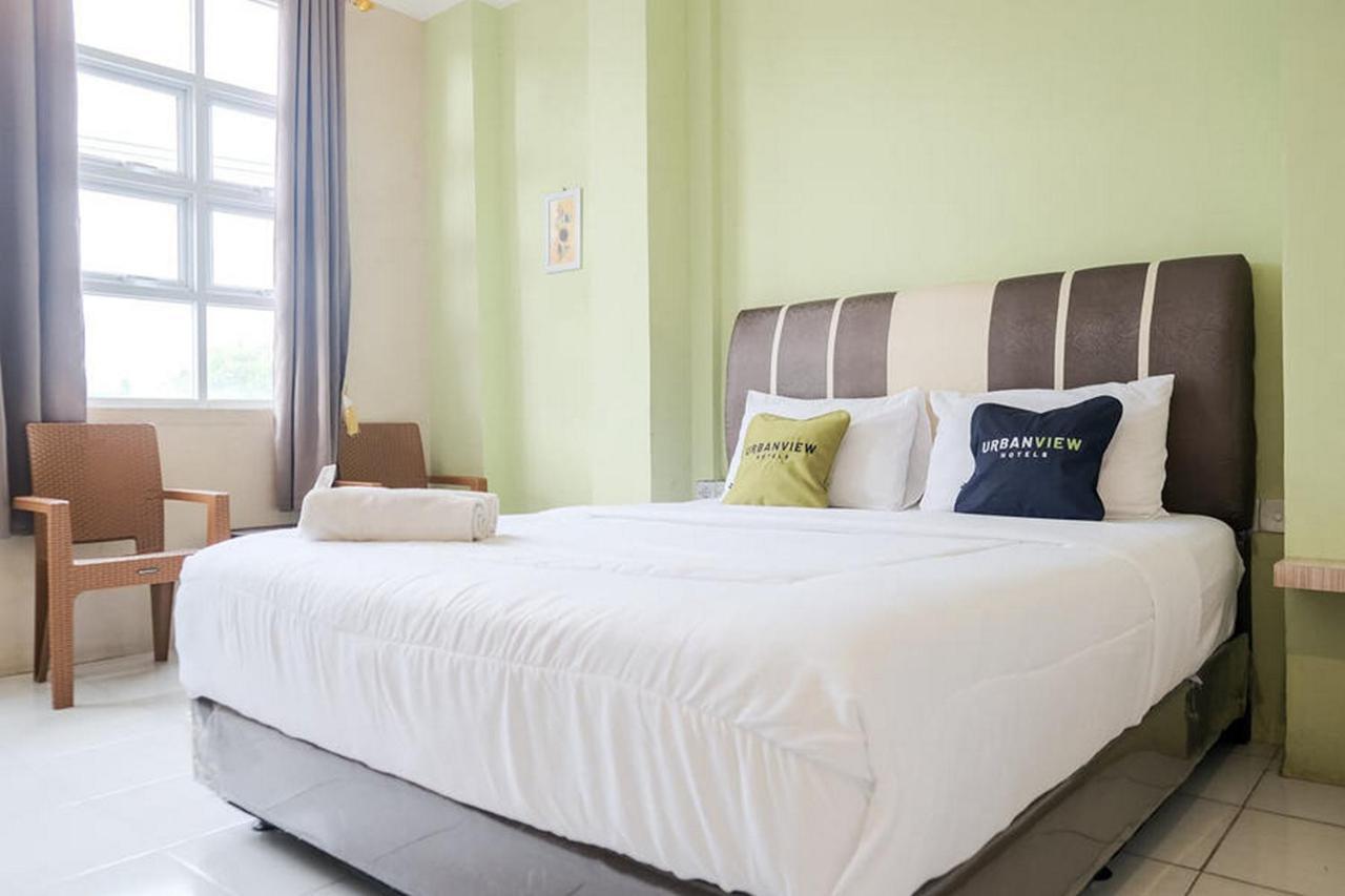 Urbanview Hotel Ta Ke Jelutung Puncak Jambi Exterior foto